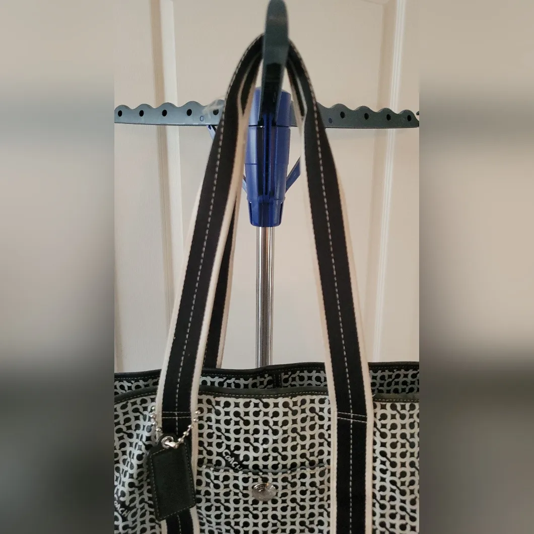 Coach Penelope Op Art Signature PVC Weekender Carry-On Tote in black and white. - Image 4