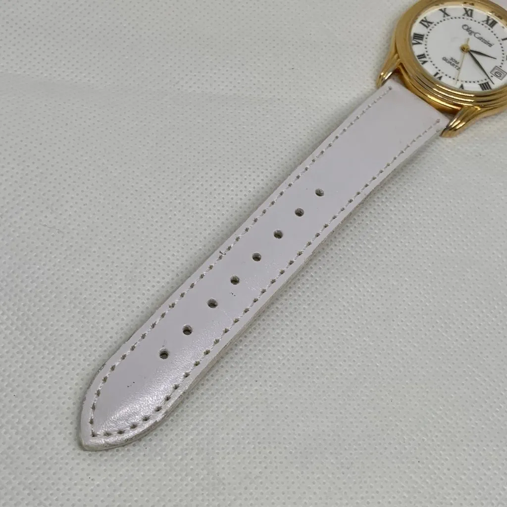 Oleg Cassini date watch gold tone 35mm Roman quartz white leather running - Image 5