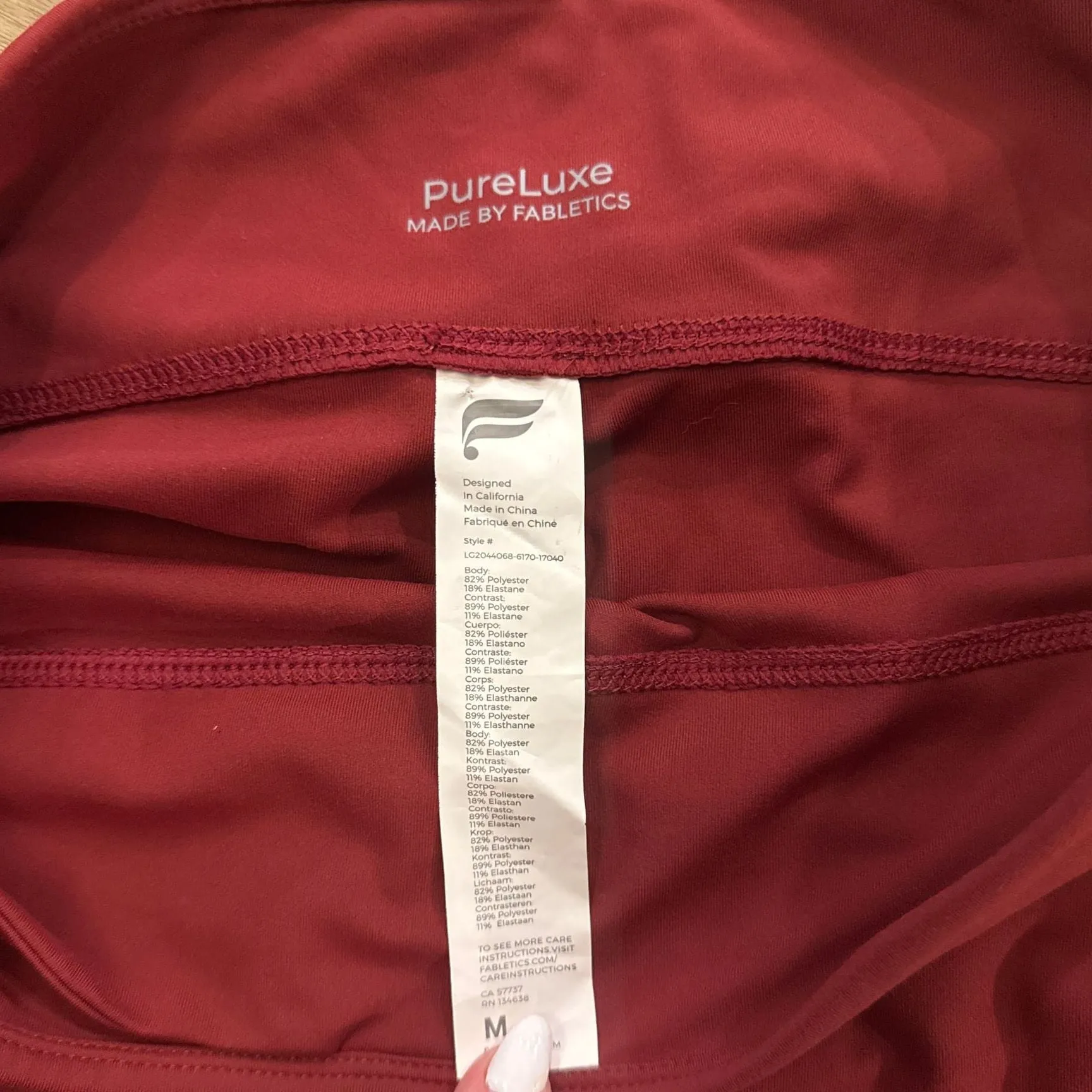 Fabletics PureLuxe Mid-Rise Ruched 7/8 Leggings in Red - Image 2