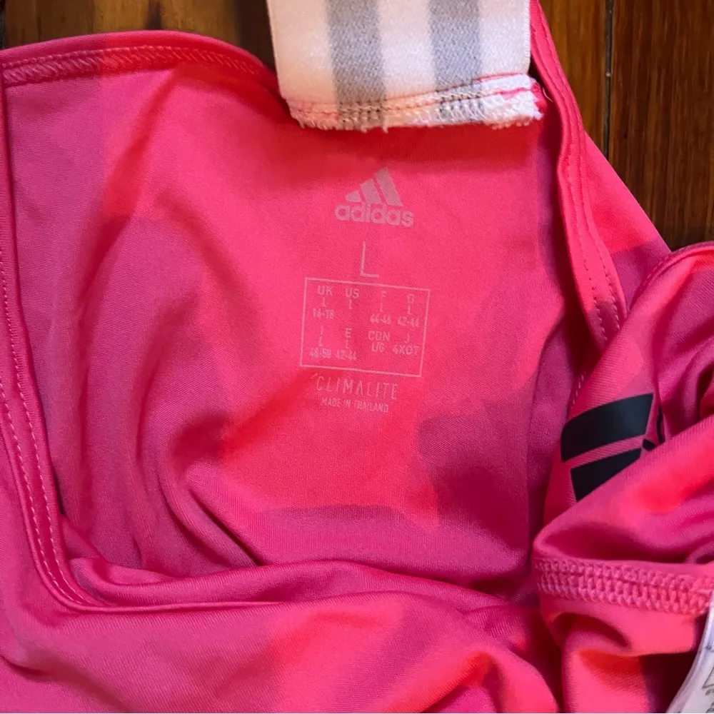Adidas pink workout tank with black and white stripe detail in back. Size Large - Image 3
