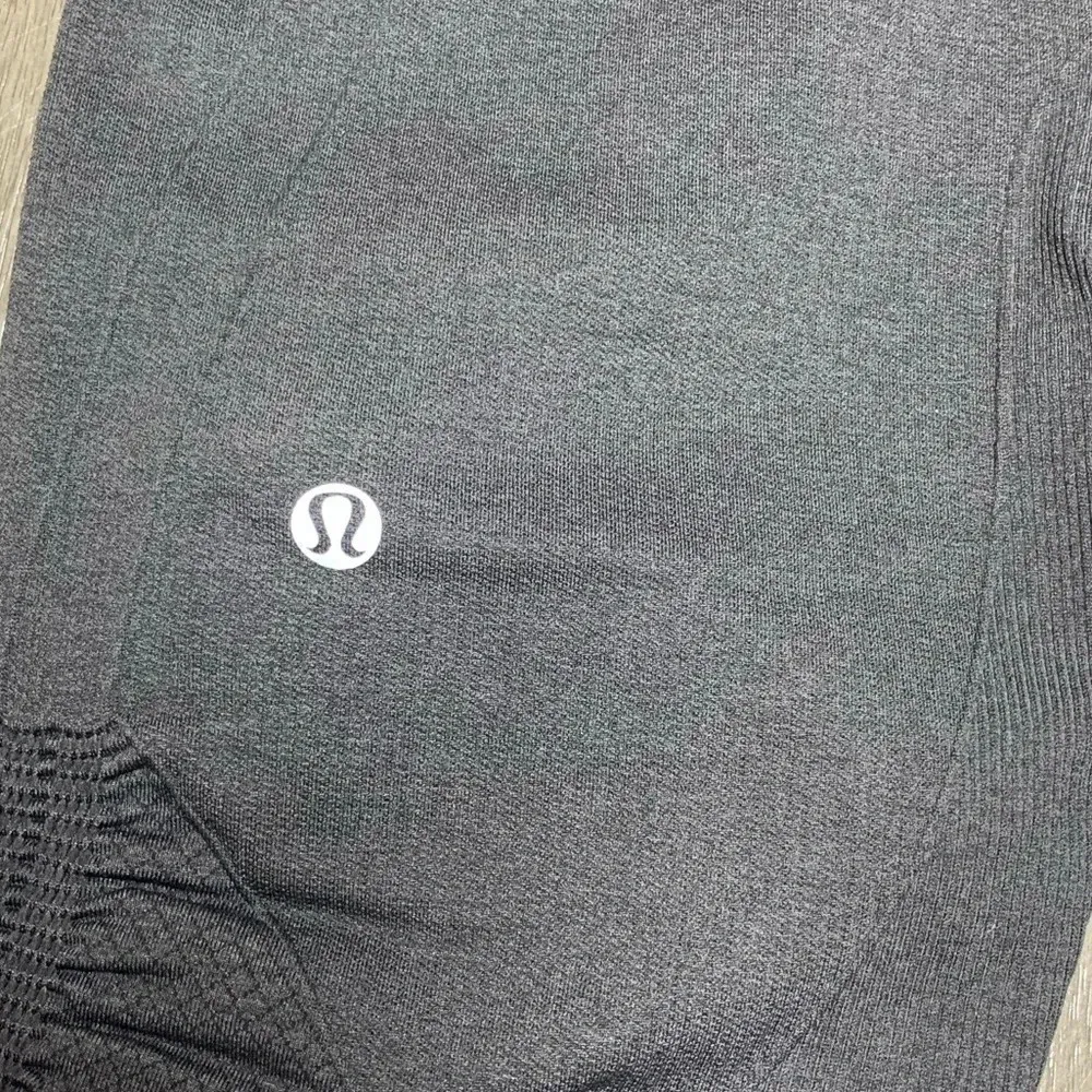 Lululemon  Ebb and Flow Crop II in Deep Coal - Image 11