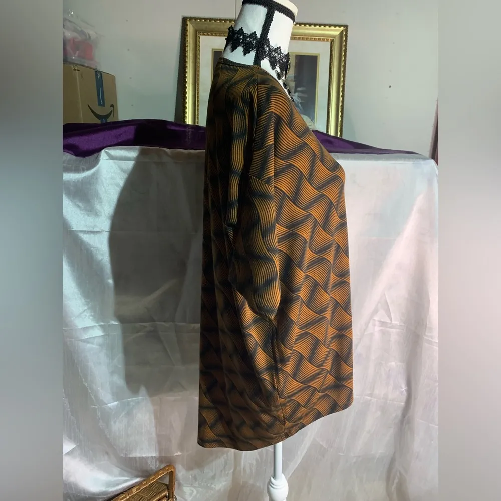 Lularoe Irma Black Orange Swirl Top - Image 4