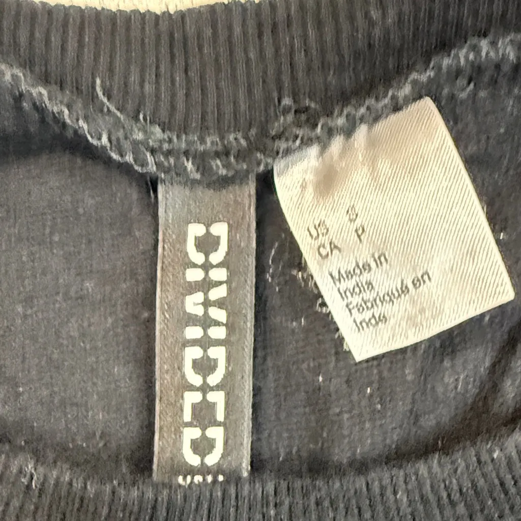 Divided Black Crewneck Sweater with White Accents - Image 2