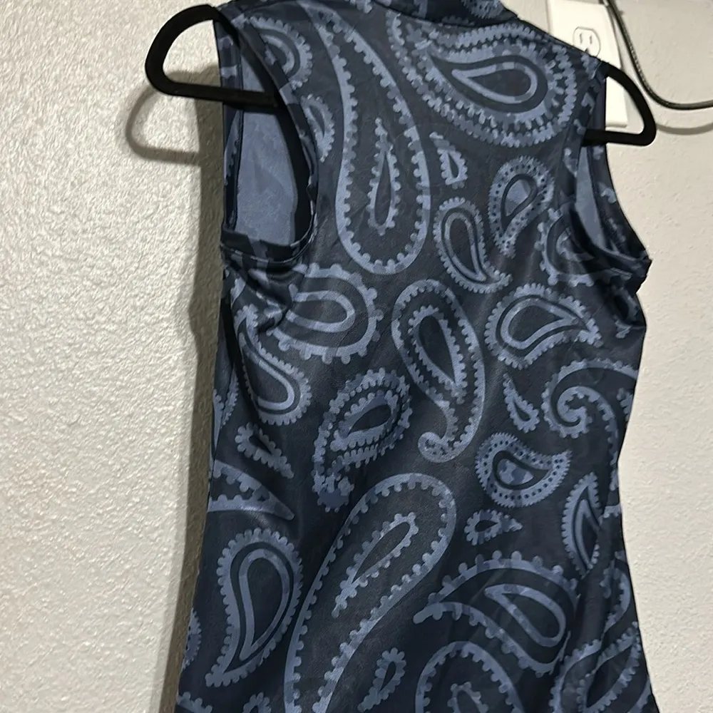 Nike Dri-FIT Victory
Women's Sleeveless Printed Golf Polo - Image 9