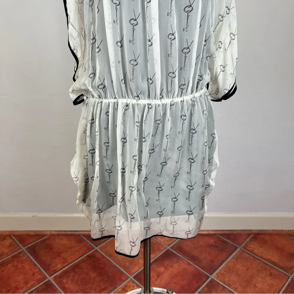 Line & Dot Key Semi Sheer Dolan Dress - Image 4