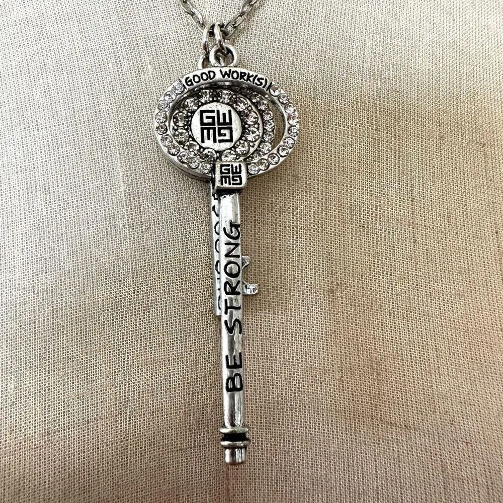 Good Work(s) “Be Strong” rhinestone key necklace on a silver chain - Image 5