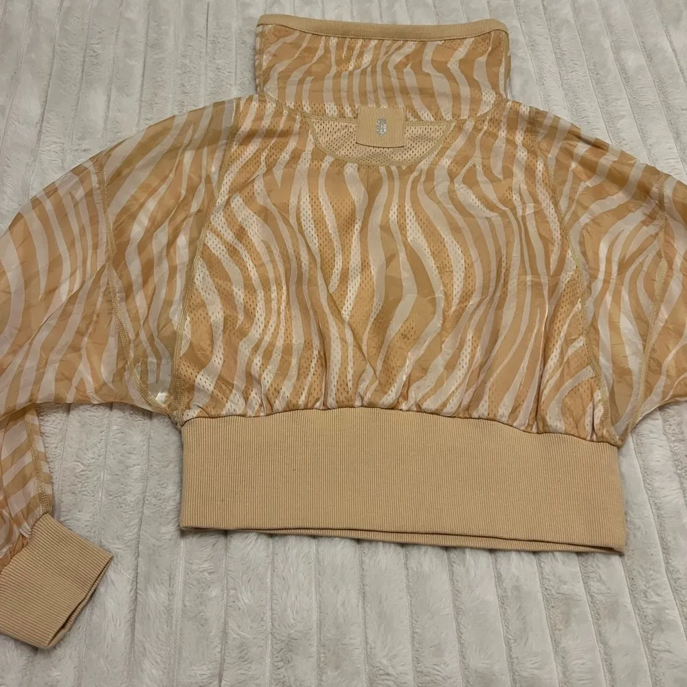 Free People Movement Tan Zebra Print half zip windbreaker - Image 8