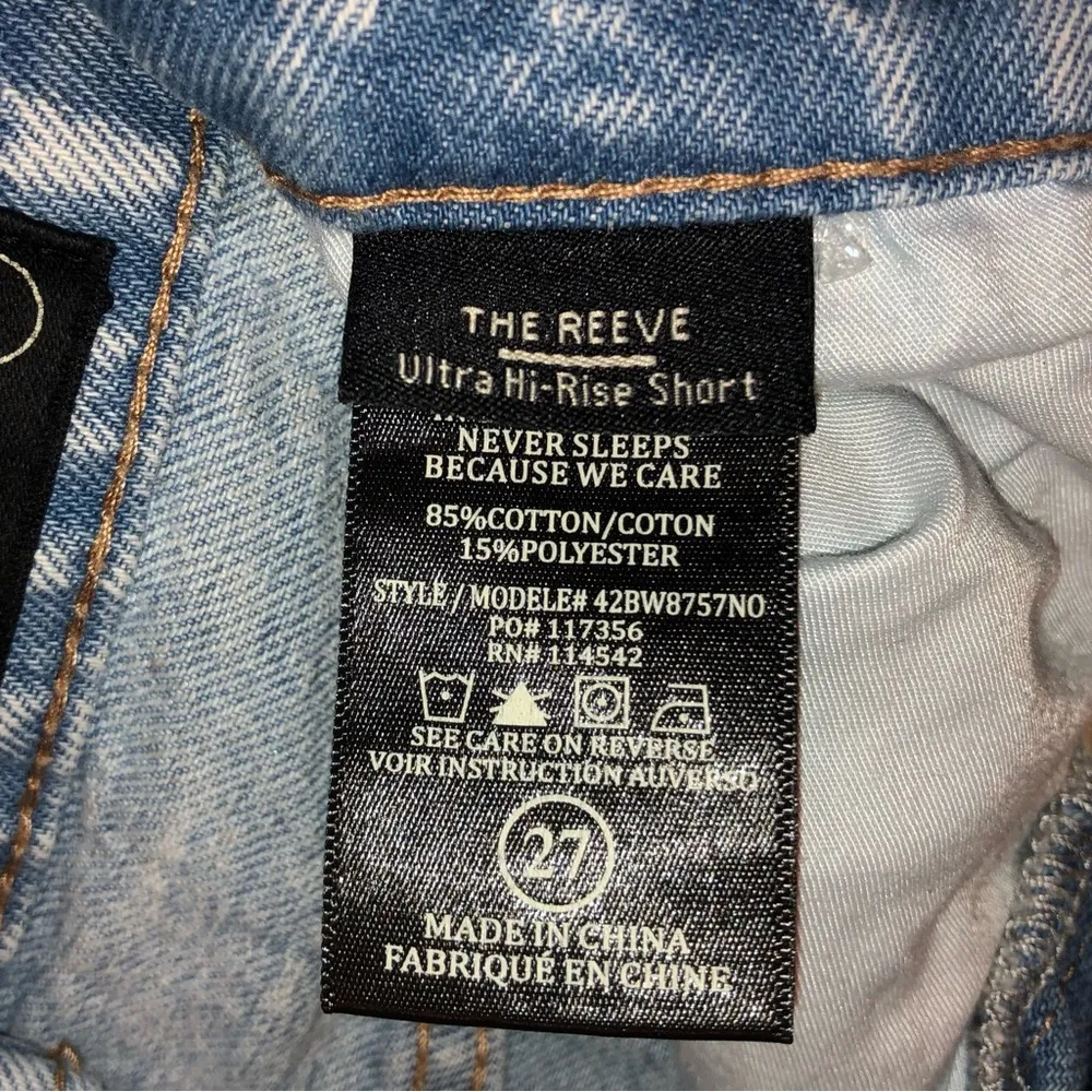 The Reeve Ultra High-Rise Frayed Raw Hem Light Wash Denim Shorts - Image 8