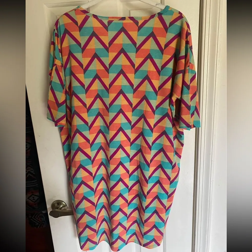 LuLaRoe Irma Shirt Blouse orange/green/purple pattern size small - Image 2