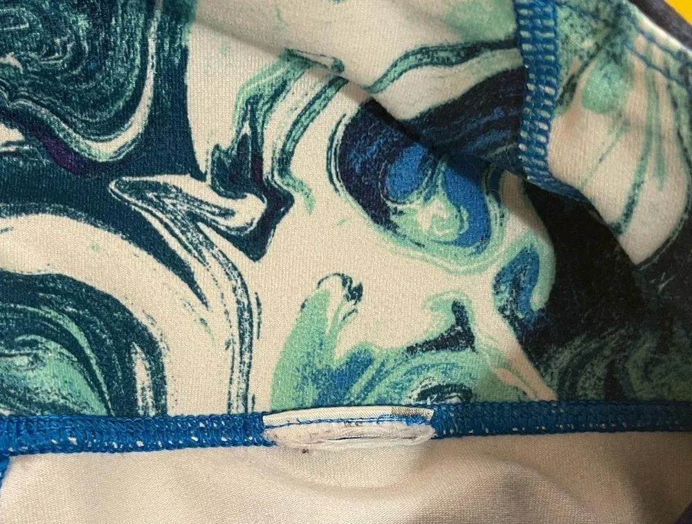 Women’s Patagonia blue/white/teal paint splash pattern leggings Medium - Image 5