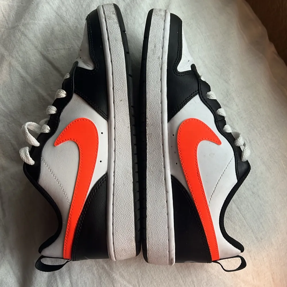 Nike dunks black white and orange - Image 2