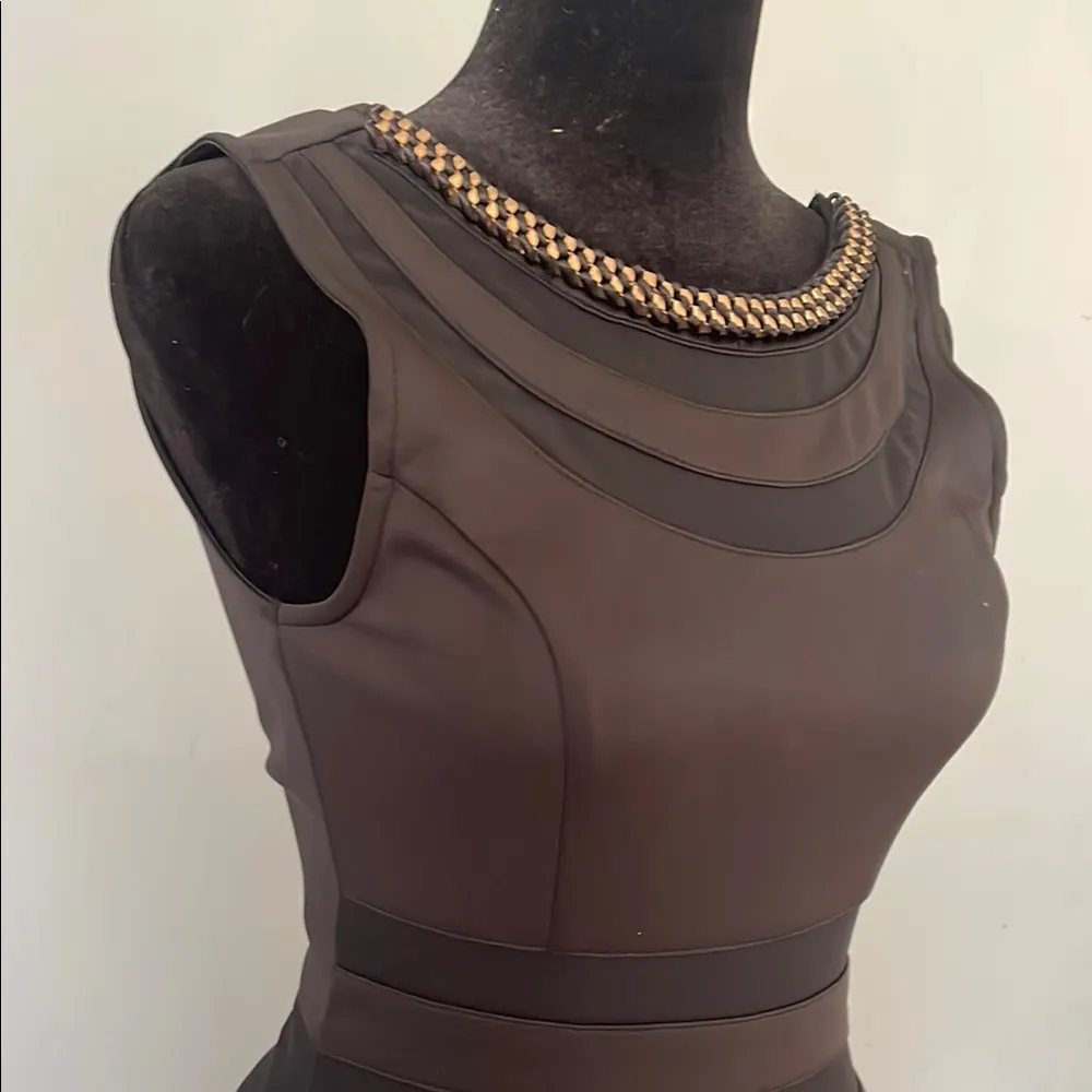 Elegant Black Sleeveless Dress with gold accents at neck - Image 2