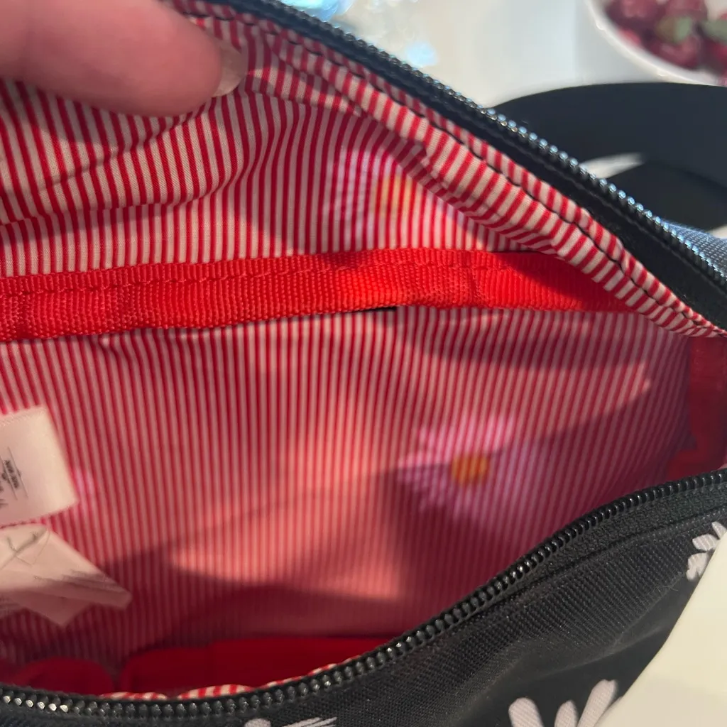 Herschel Supply Co. Black Daisy Print Travel Bag - Image 2