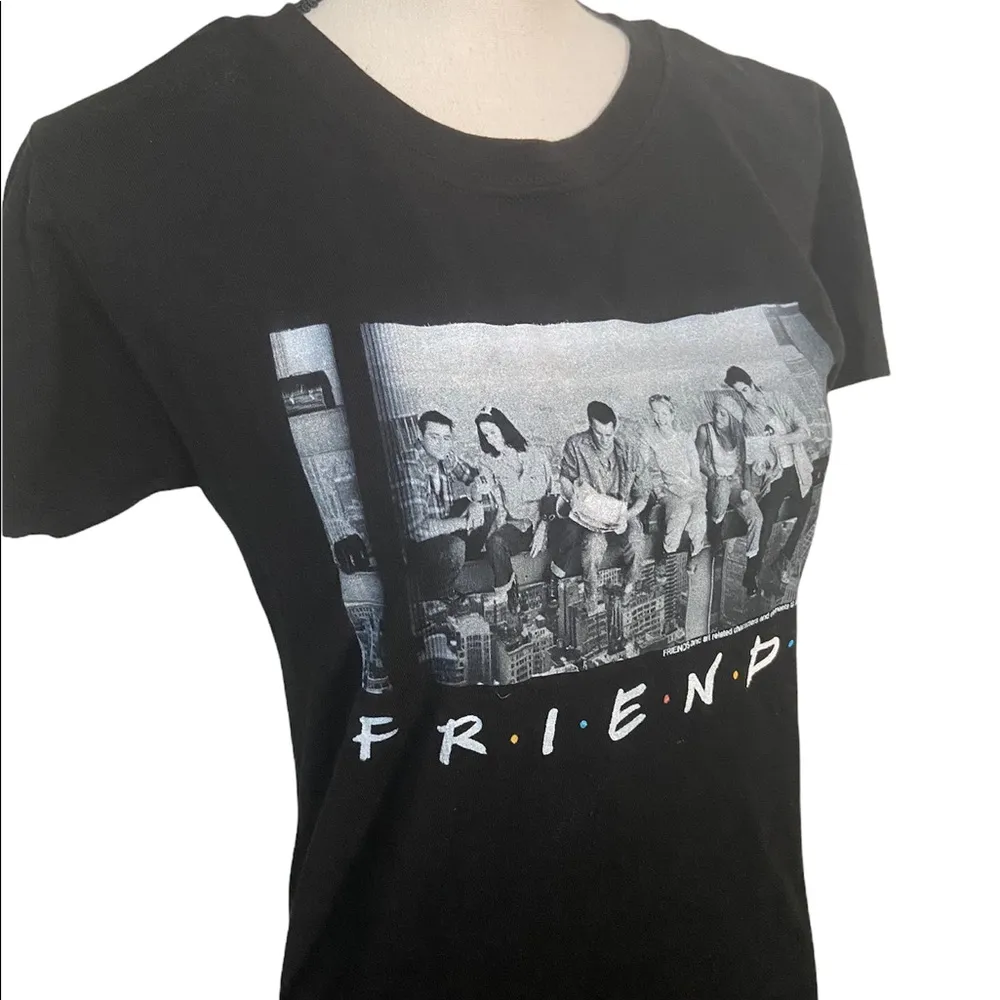 Friend’s large black t-shirt. - Image 2