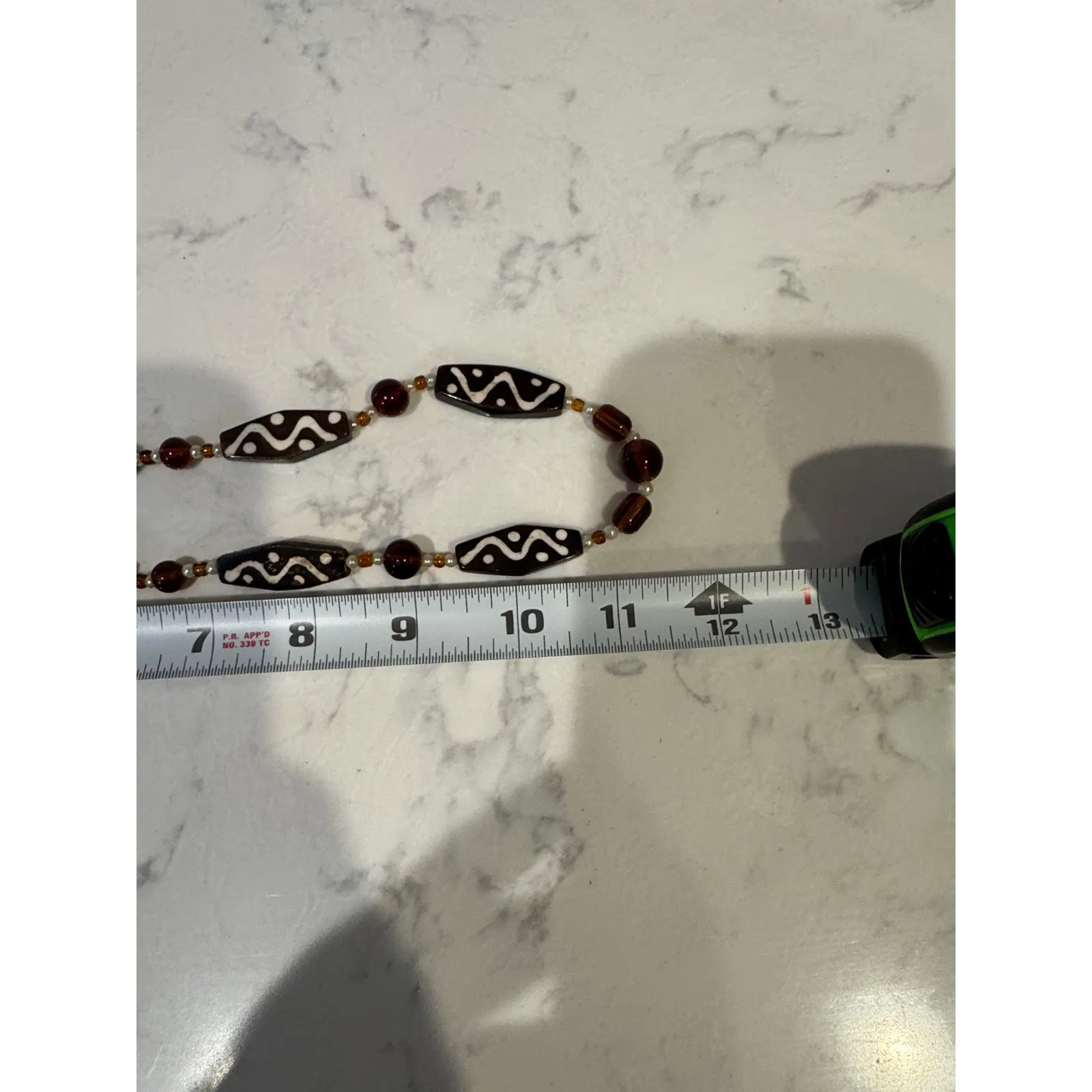 handcrafted ethnic style beaded necklace dark brown oval beads etched pattern - Image 6