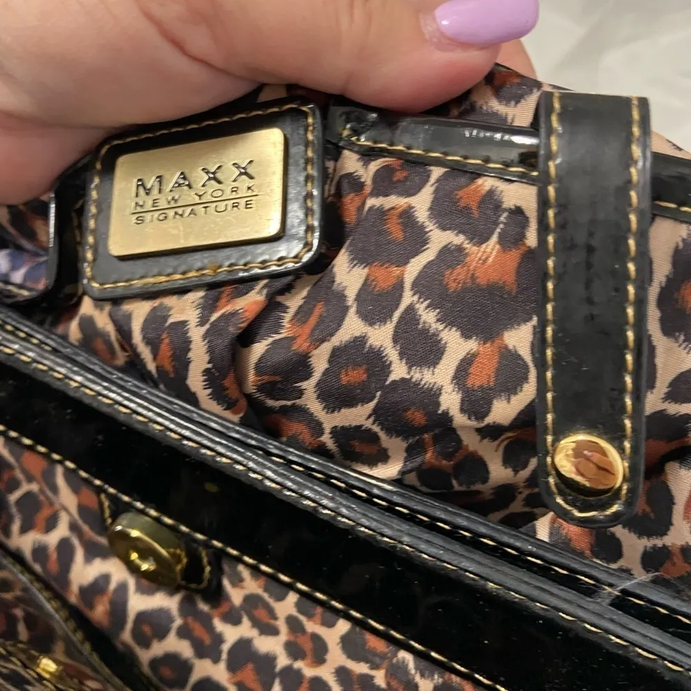 Maxx New York black patent quilted purse w gold chains on handles cheetah lining - Image 7