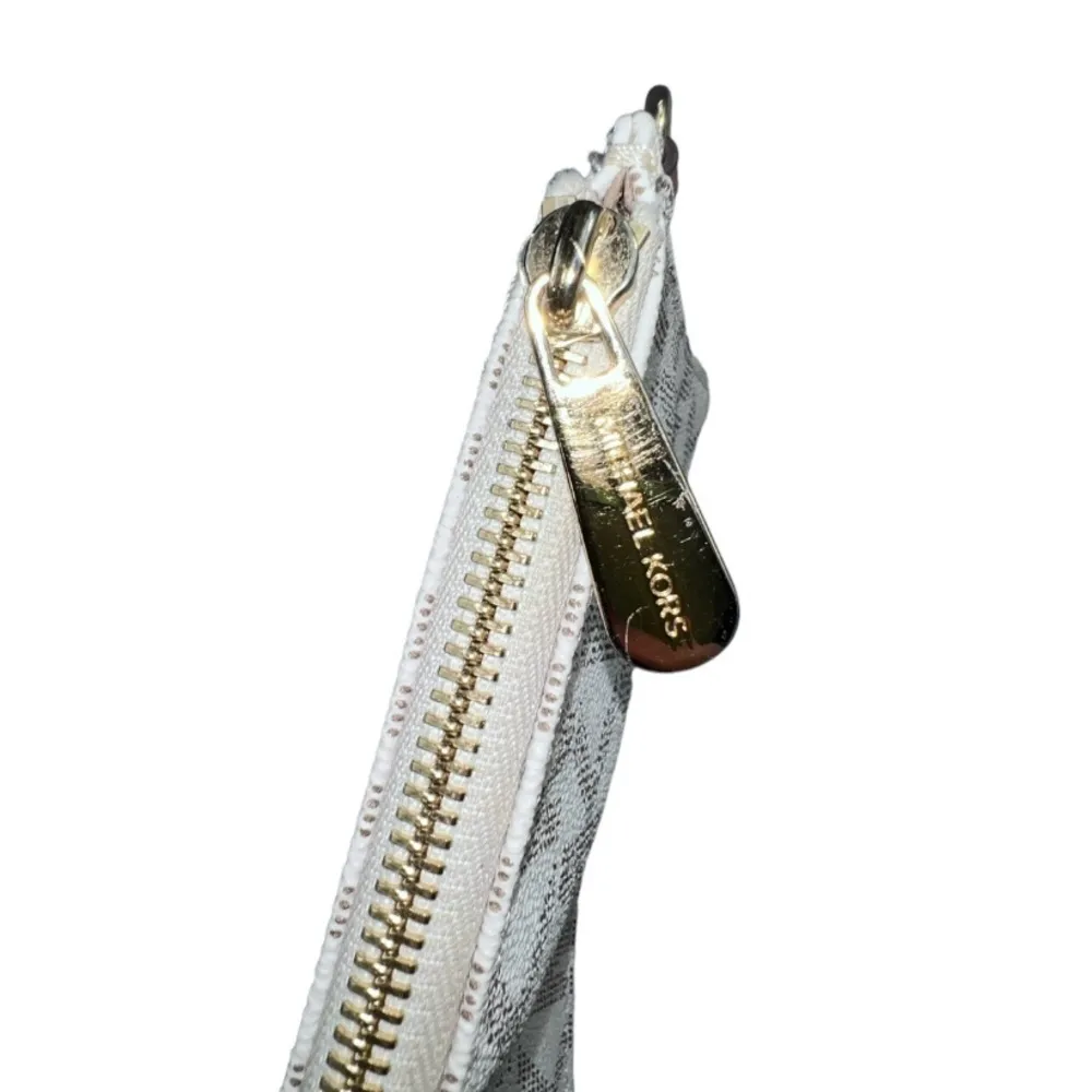 Michael Kors Bucket Bag in the beige monogram print. - Image 6