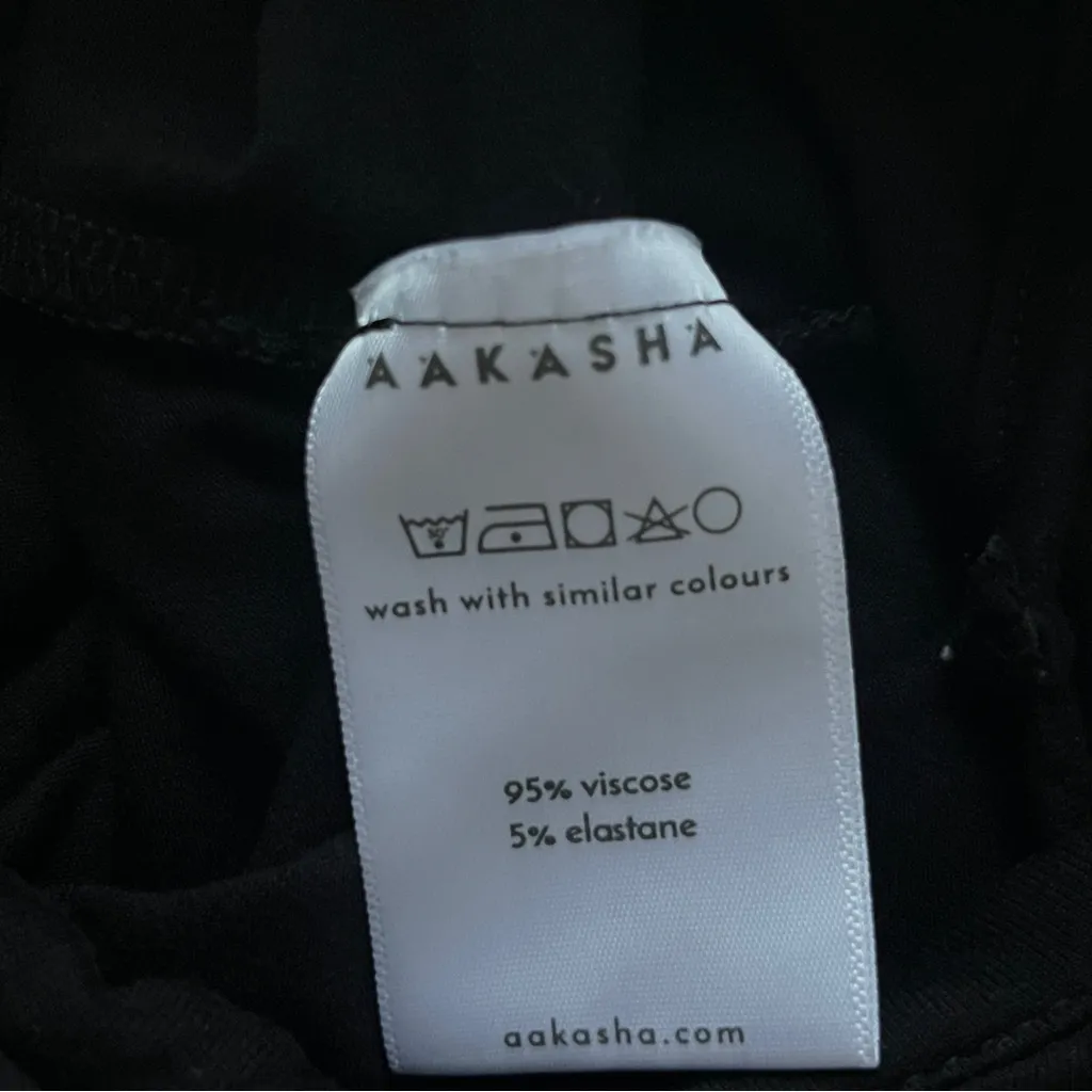 Sophisticated Black Sleeveless Jumpsuit - Image 12