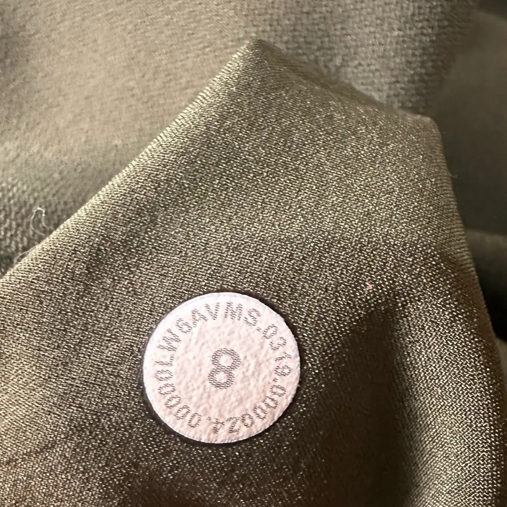 Lululemon On the Fly Crop Woven 23" Dark Olive Green Pants - Image 7