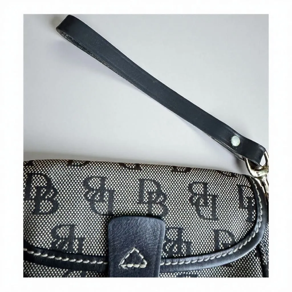 Dooney & Bourke Black and Cream Wristlet - Image 5