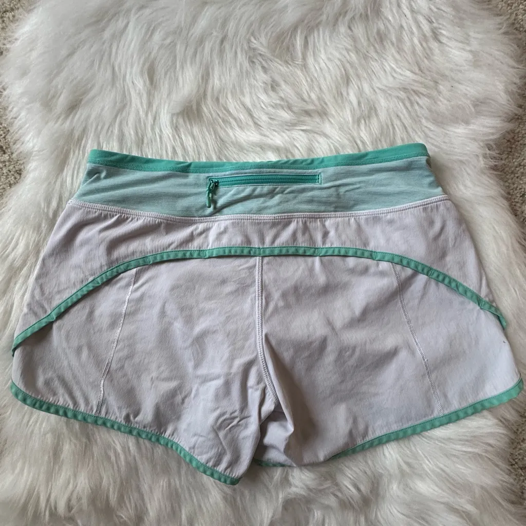 Lululemon Size 6 Turbo Running Short in white with a mint green waistband - Image 4