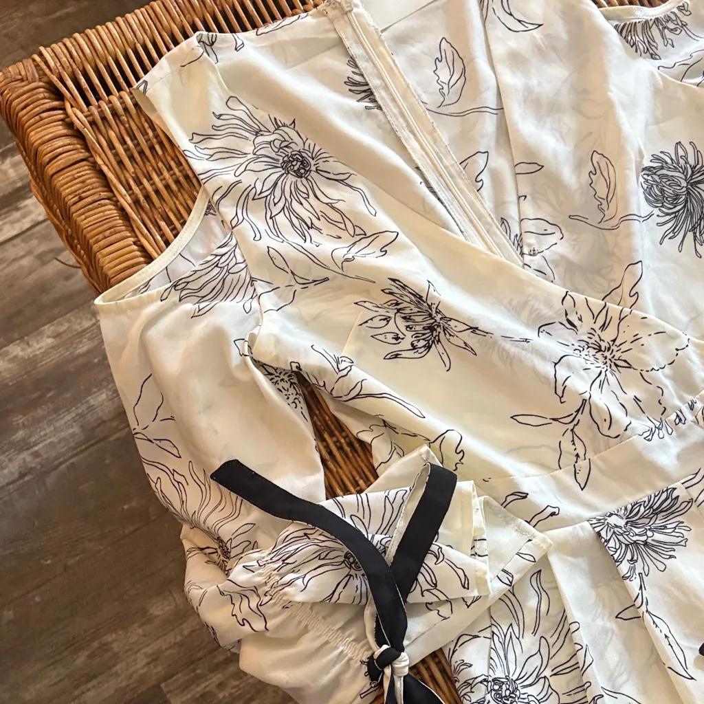 J.O.A. Los Angeles Floral Romper with Black Tie at wrist. - Image 3