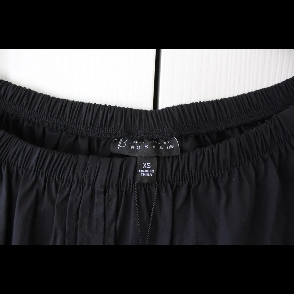 Bobeau black off the shoulder top with colorful pom poms - Image 6