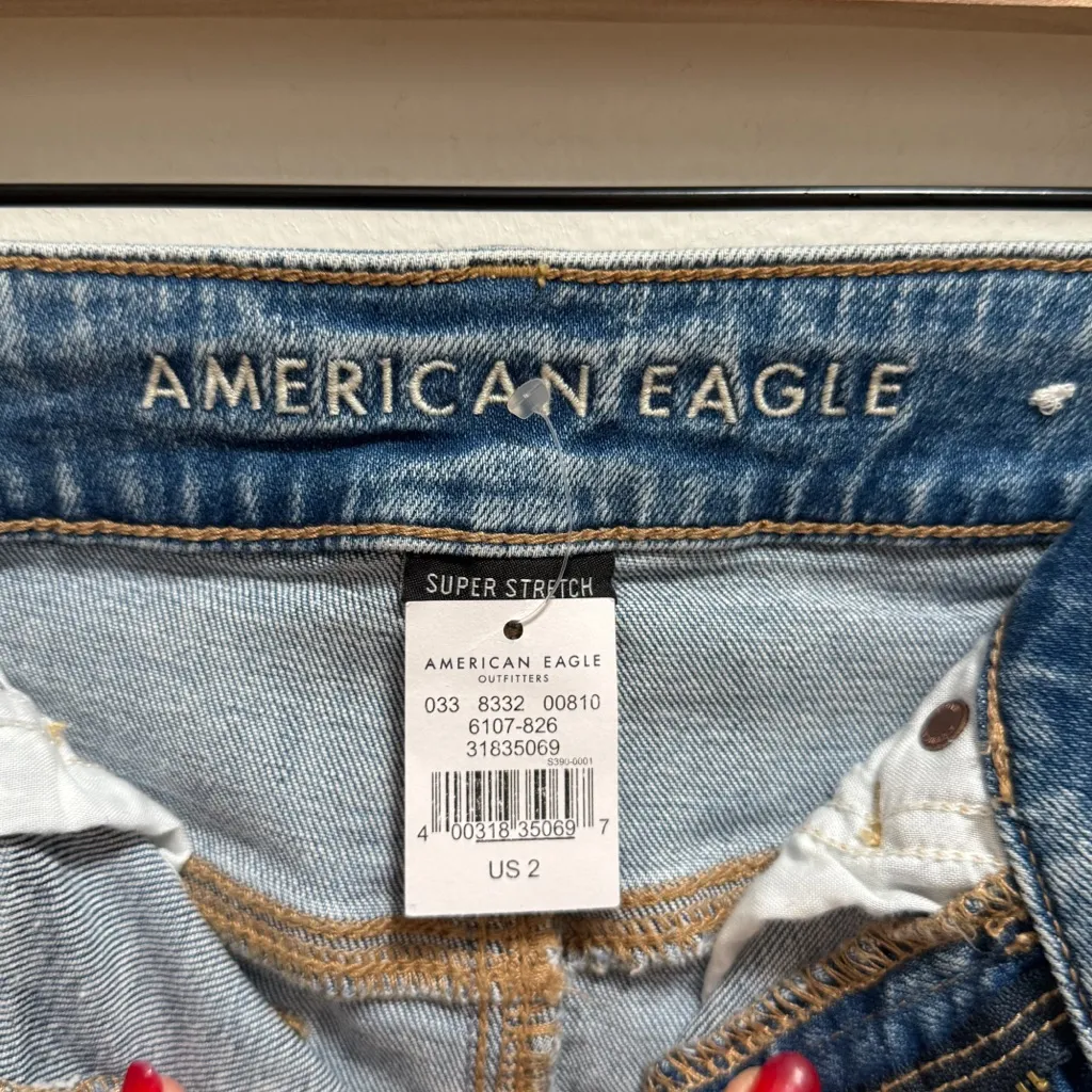 American Eagle high rise light wash distressed stretch denim mini skirt 2 NWT - Image 7
