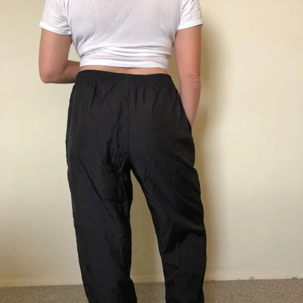 Vintage Reebok Black Windbreaker Track Pants - Image 2