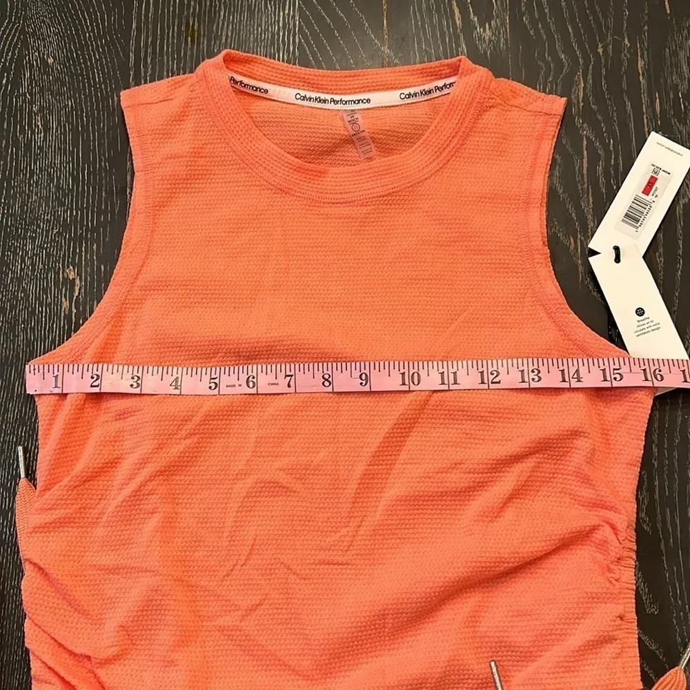 Calvin Klein Performance orange cinched side athletic top sz XS Cotton NWT - Image 9