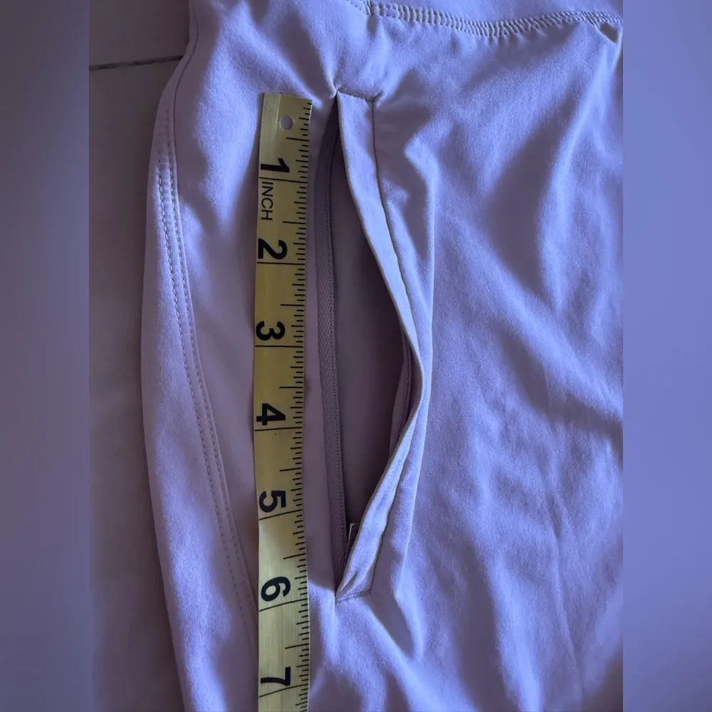 Athleta straight-leg joggers in size 18. These pants have a relaxed fit, a wide - Image 11