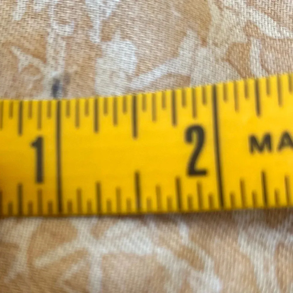 Elephant novelty print scarf with tassels at each corner. Measures 70.9” x 35.4” - Image 5