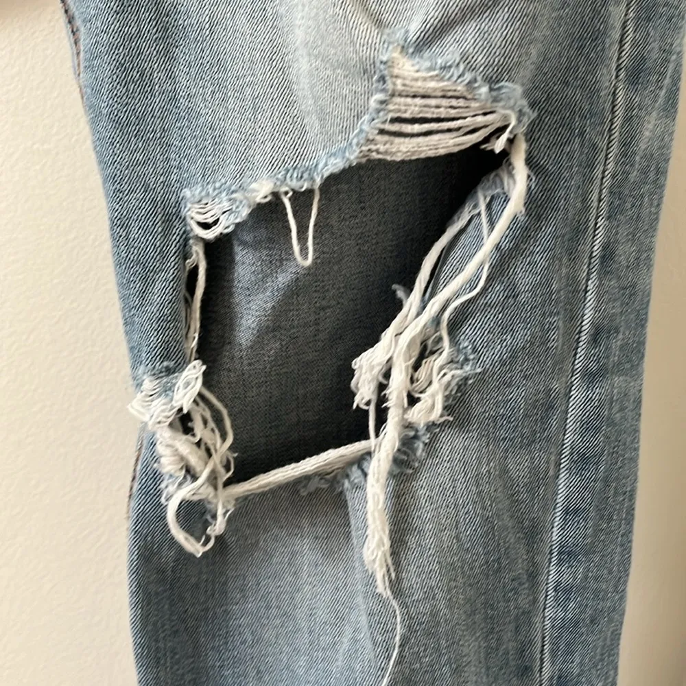 American Eagle TOMGIRL denim in size 8 with holes - Image 5