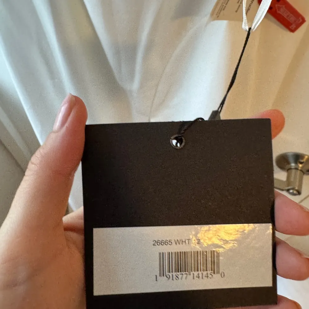 Mac Duggal White One-Shoulder Bow Gown - Image 4