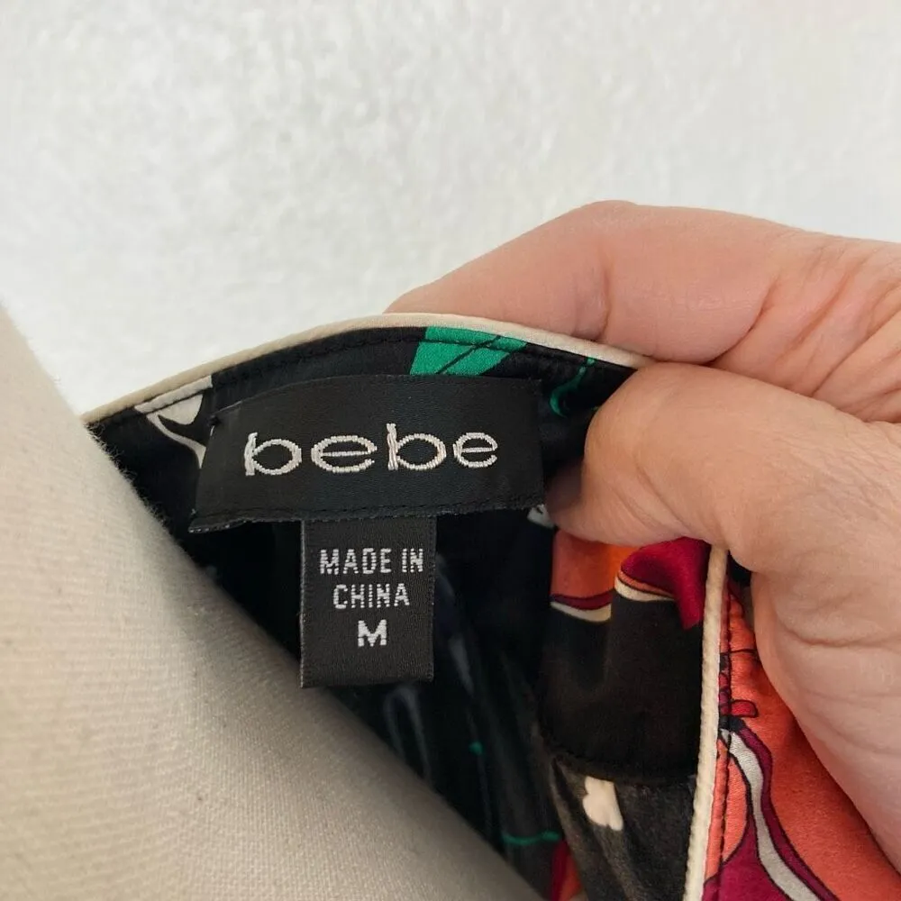 Bebe SS floral baby doll black silk blouse women’s M flutter sleeve rosette  ￼ - Image 5