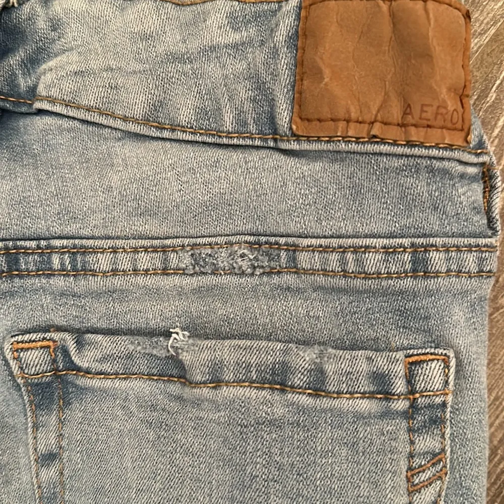 Women’s  size 0 low rise jegging light wash destroyed stretchy jeans - Image 6