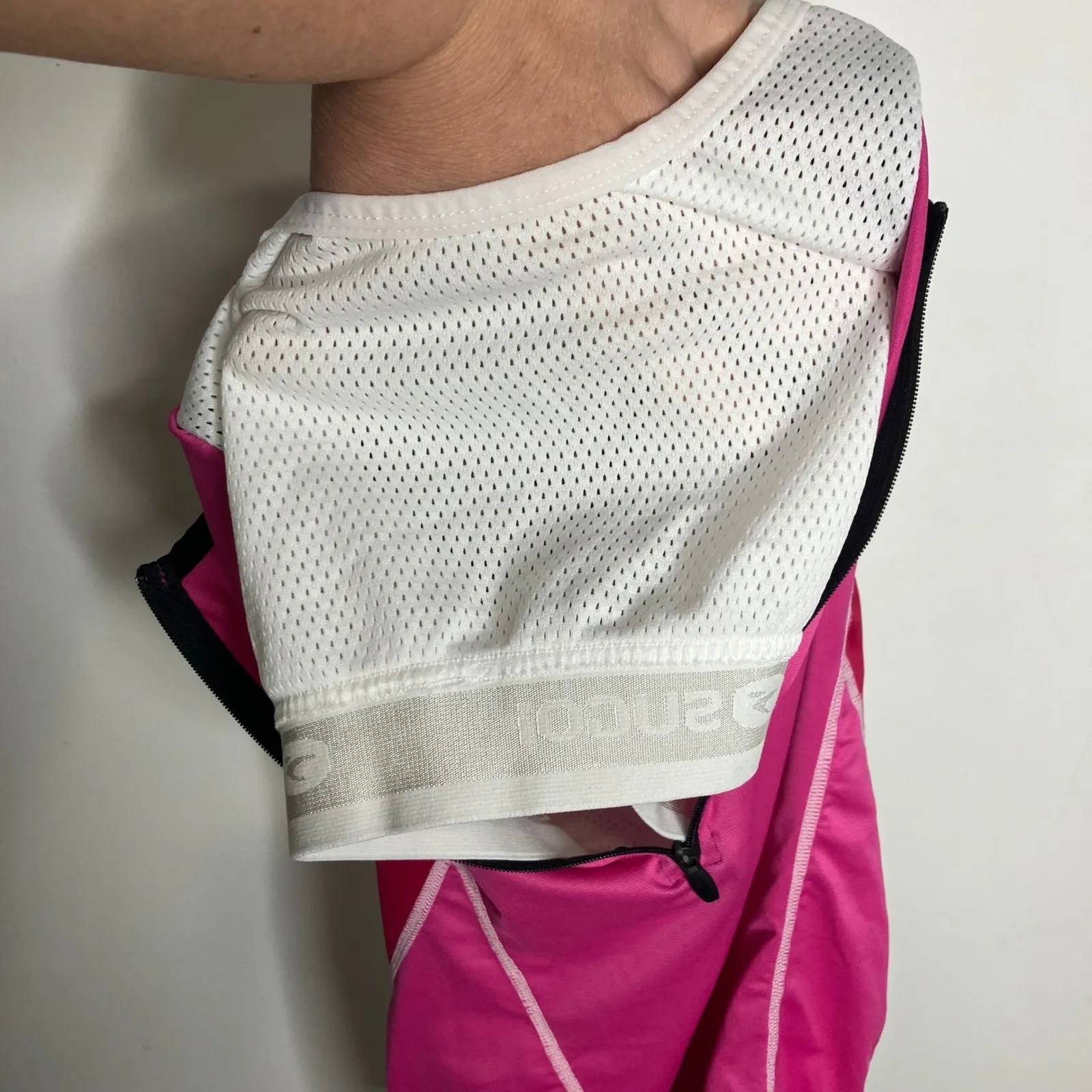 Sugoi cycling tank top with shelf bra pink white road bike women's size medium - Image 9