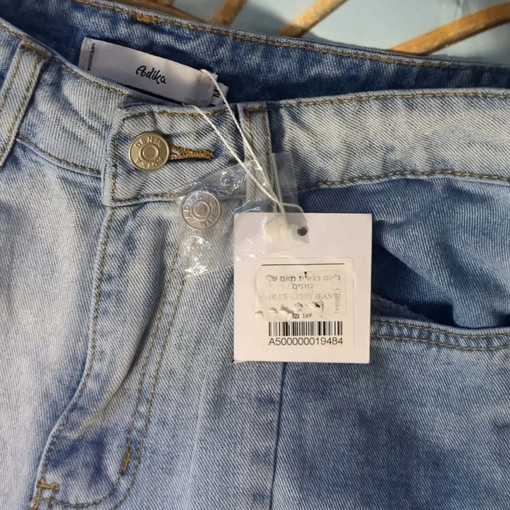 ADIKA blue light jeans size medium - Image 2