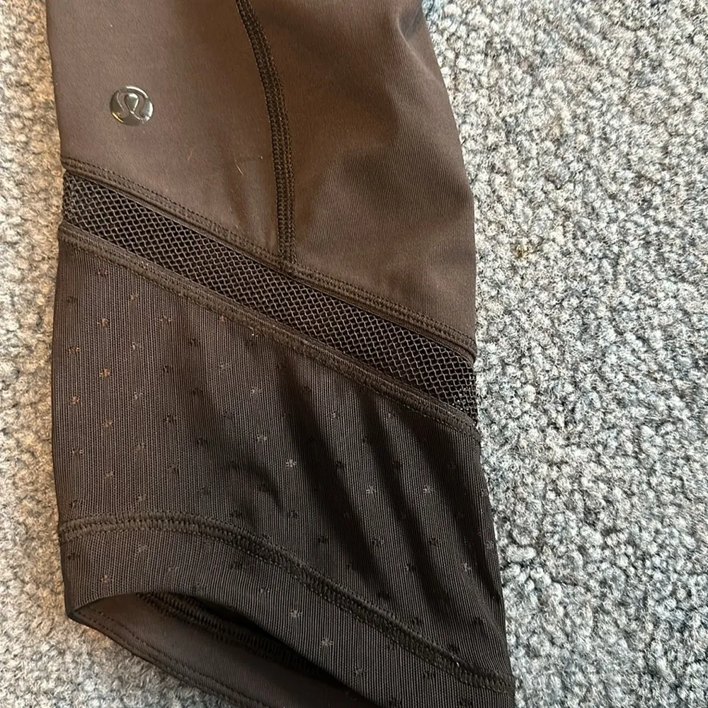 lululemon leggings size 4 cropped black thick fabric tight with netting detail - Image 2