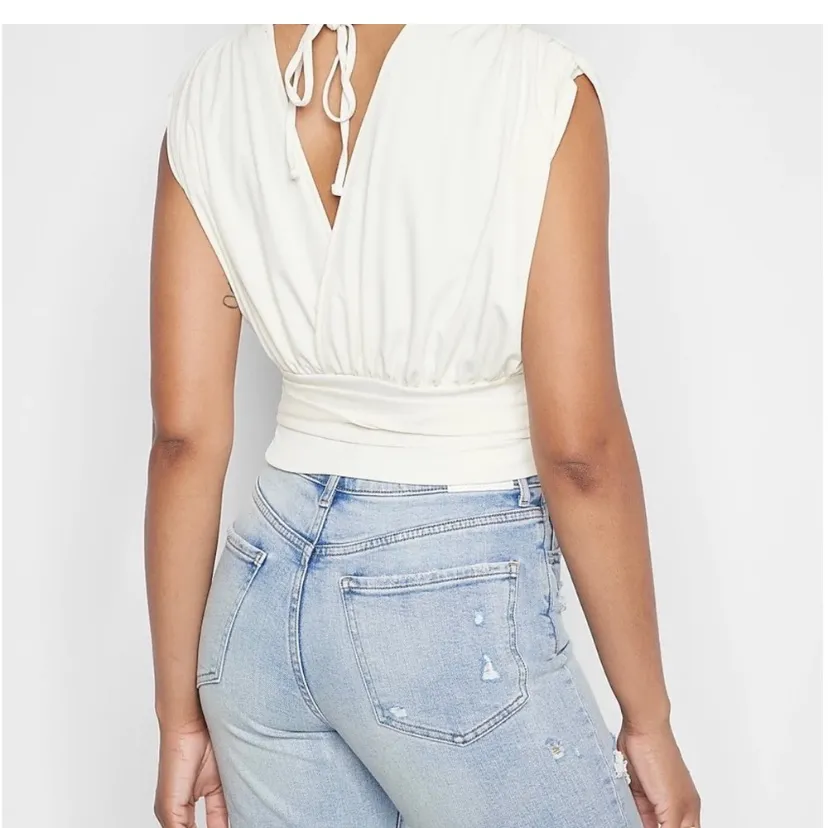 Express Cream Sleeveless Wrap Blouse - Image 2
