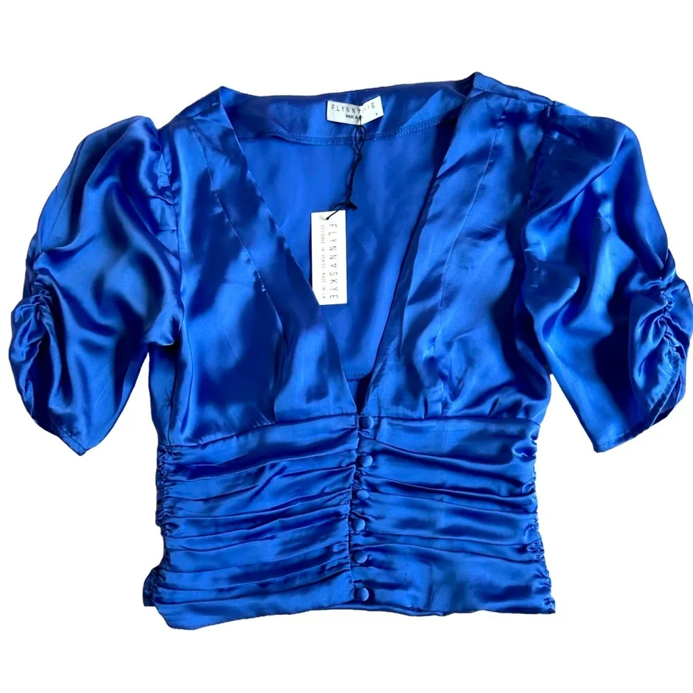Flynn Skye small blue satin puff sleeve button down ruched bodice vneck sexy top - Image 1