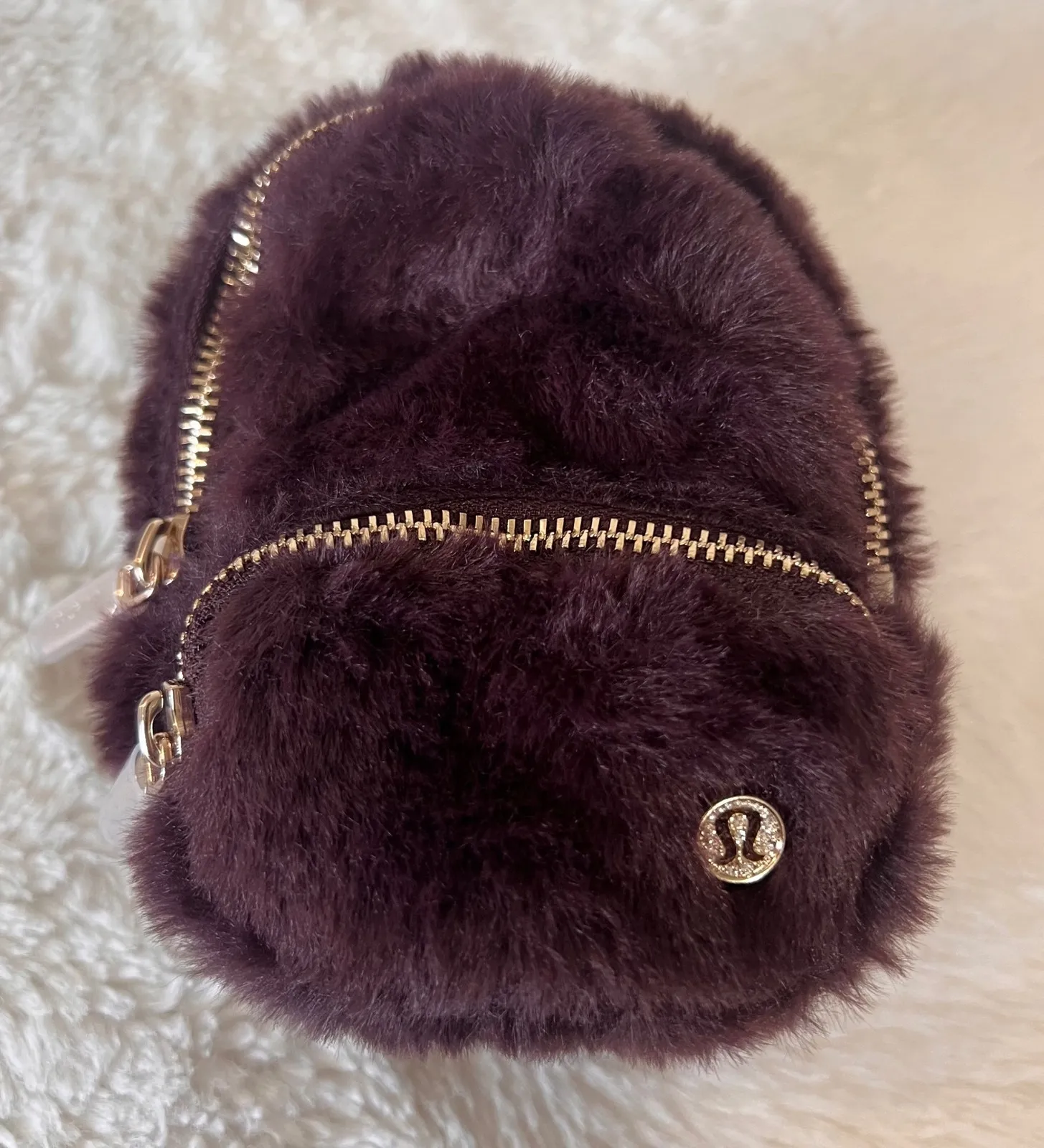 Lululemon Everywhere Nano Backpack Plush Fleece Black Plum Gold Womens Accessory Purple - $38 (44% Off Retail) New With Tags - From Dawnns Lululemon Everywhere Nano Backpack Plush Fleece Black Plum Gold Womens Accessory Purple - $38 (44% Off Retail) New With Tags - From Dawnns