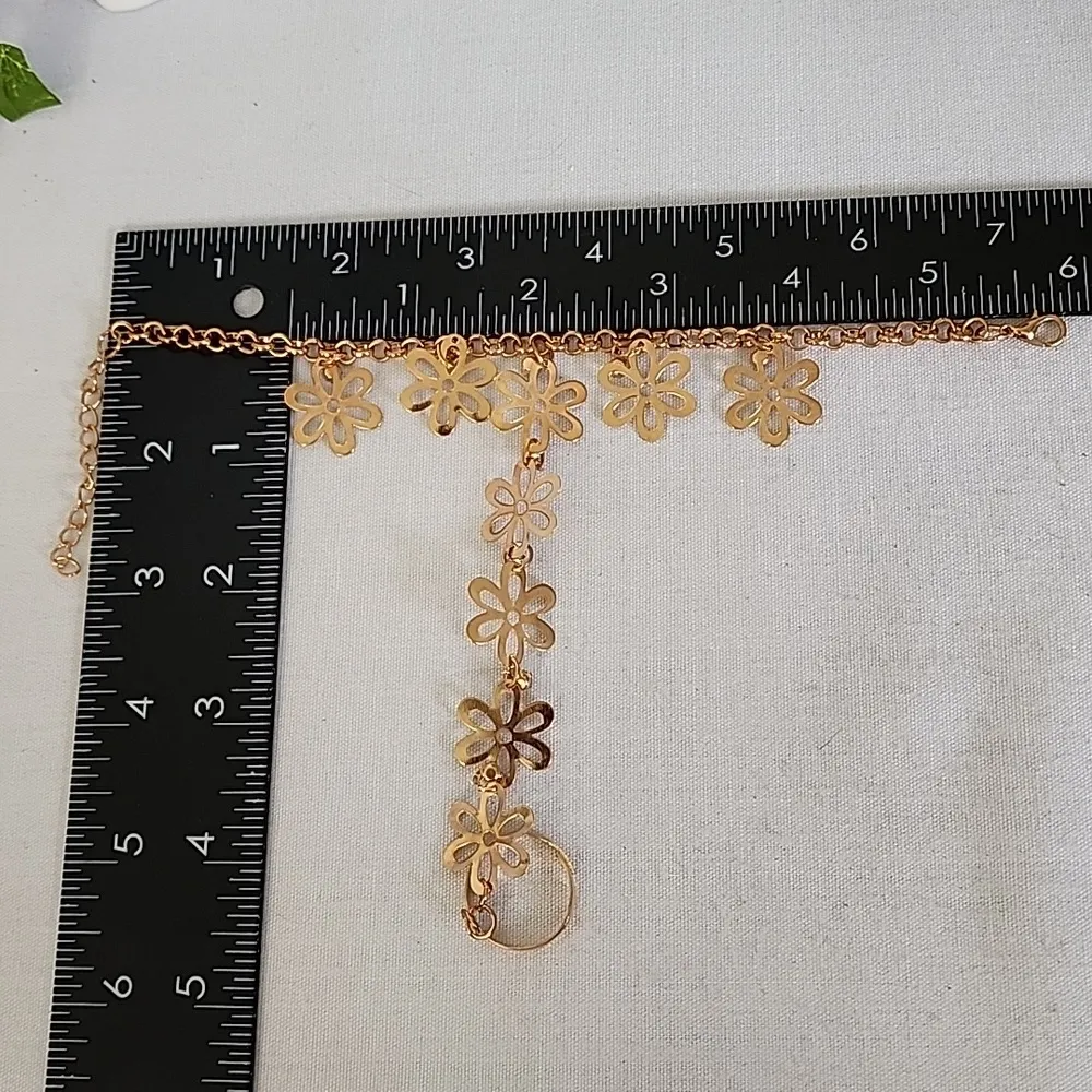 Gold Flower Bracelet with Attached Ring - Image 5