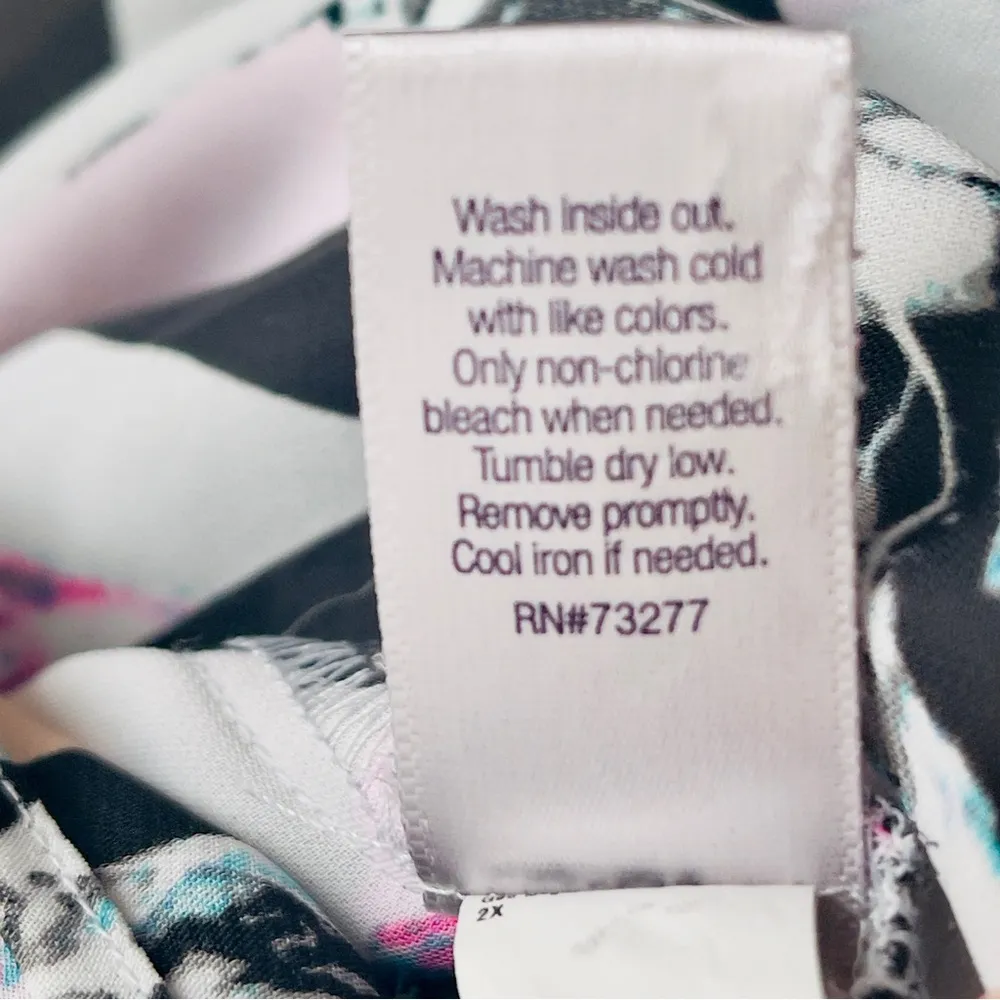 Jennifer Lopez long sleeve blouse with V cut out back button cuff sleeves - Image 7