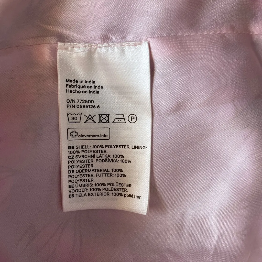 Calf-length A-line‎ dress in pink chiffon with a floral printed pattern. Size 12 - Image 6