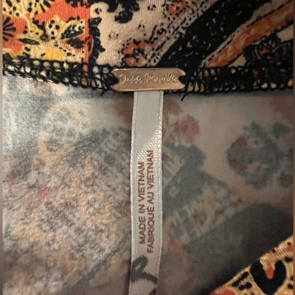 Free people skirt. Ruching and wrapping with their signature cool print! - Image 4