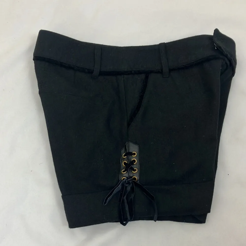 Image black cuffed mini shorts with lace up details woman’s size small - Image 8