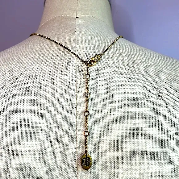 Juicy Couture heart-shaped pink rhinestone peace sign on antique gold necklace - Image 6