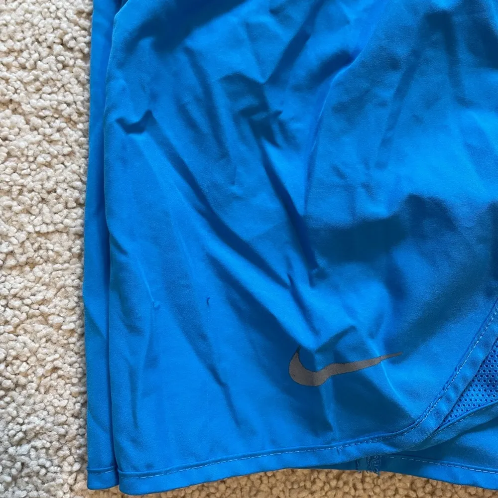 Blue Nike athletic shorts - Image 6