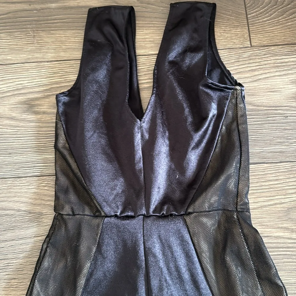 Vintage fun and funky stretchy v neck deep v back end flared leg  Black Jumpsuit - Image 3